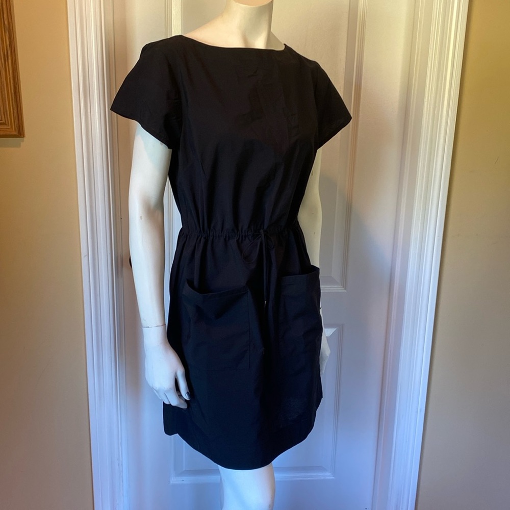 Black mini dress with front pockets
